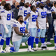 Dallas Cowboys defensive tackle Dontari Poe (95) kneels during the National Anthem to bring attention to social justice issues before an NFL football game against the Arizona Cardinals, Monday, Oct. 19, 2020, in Arlington, Texas. Arizona won 38-10.